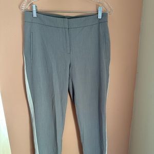 grey and white slacks